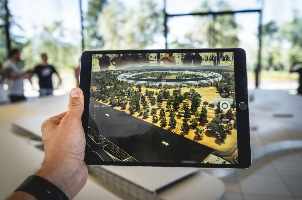 Tablet showing AR view of architecture project